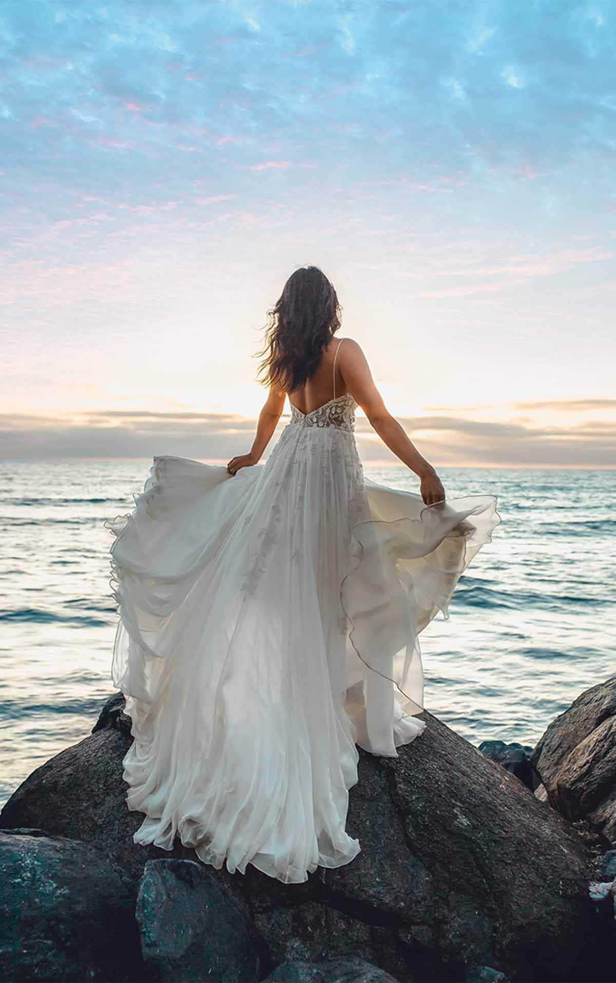 A modern A-line boho floral wedding dress