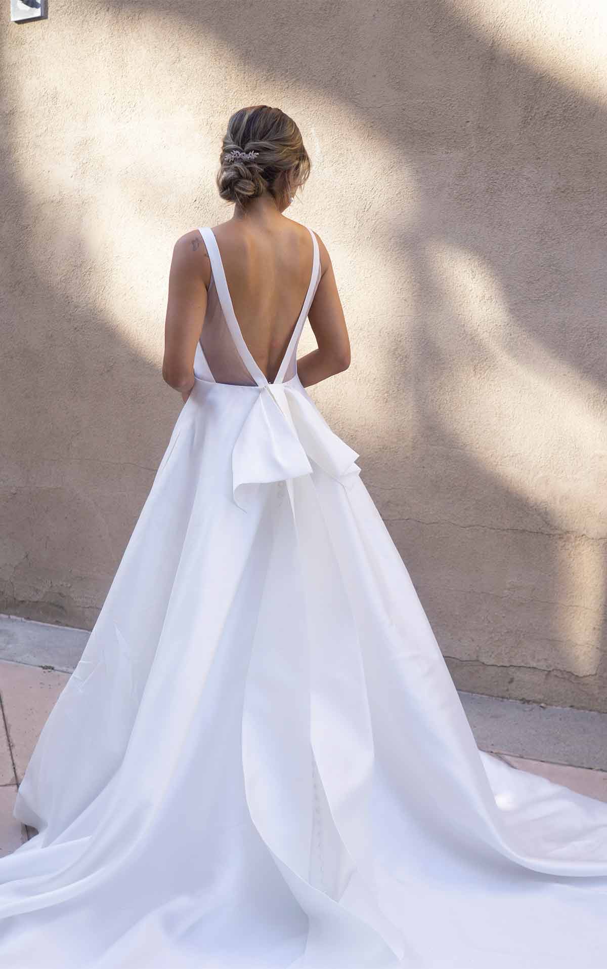 1275 Clean Modern Ballgown with Wide Straps and Bow by Martina Liana