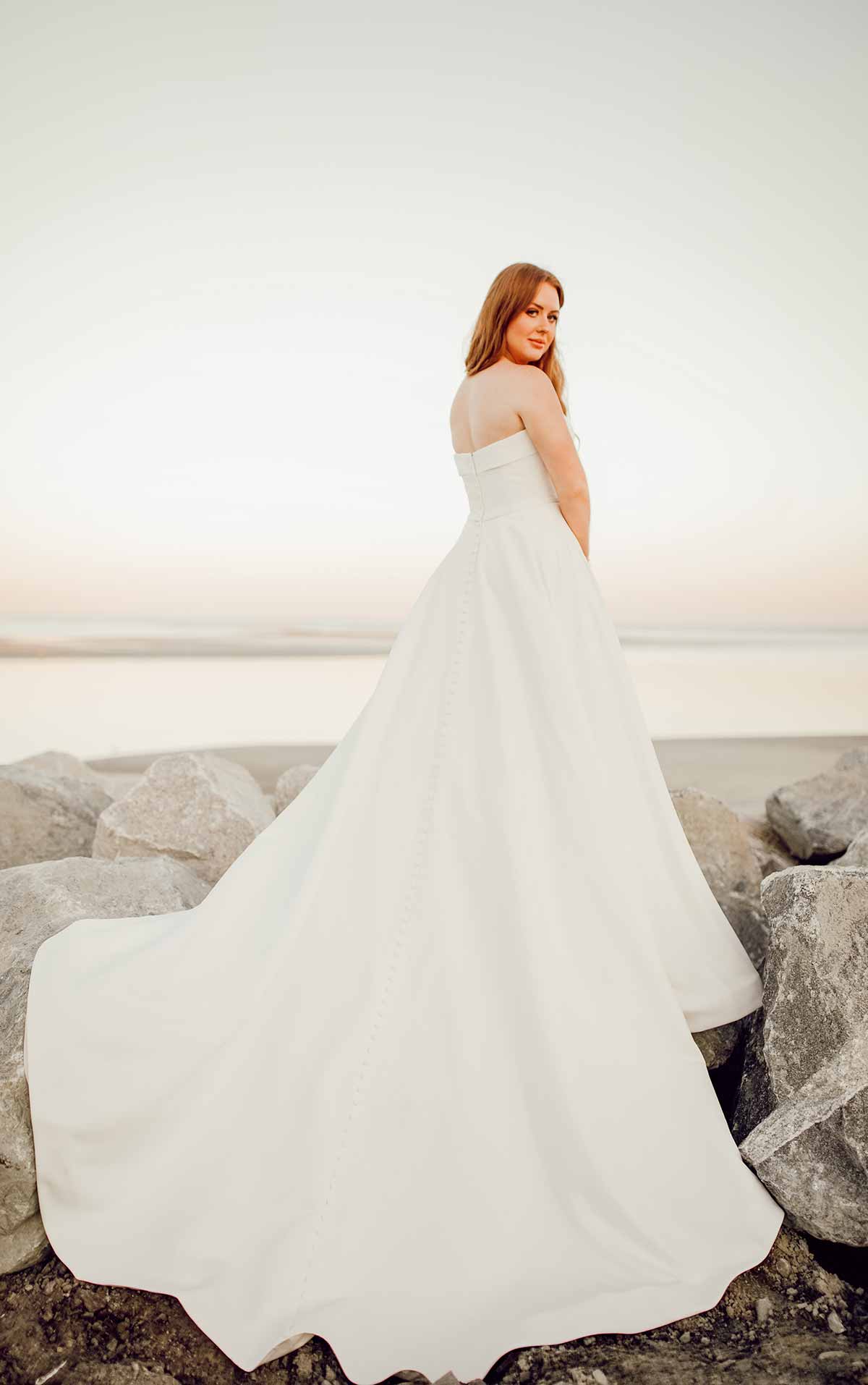 7045 Simple Strapless Wedding Gown with Pockets by Stella York